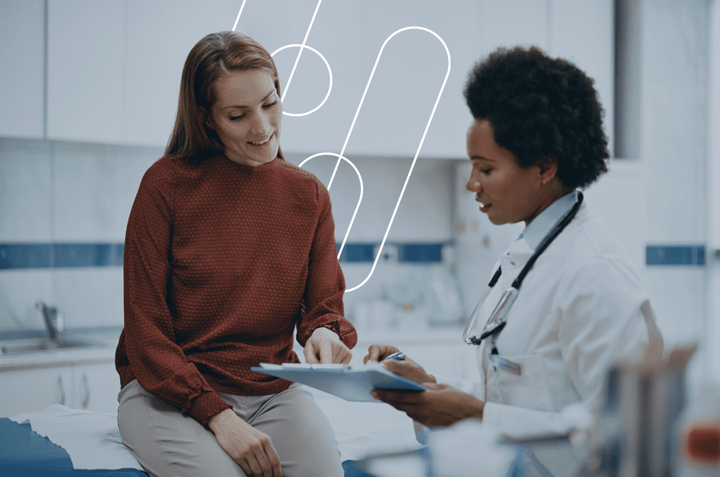 a patient and doctor looking at a tablet together